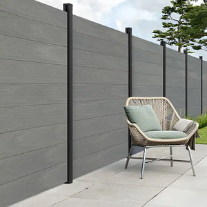 Natural finish composite garden fencing installed outdoors