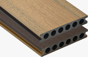 Teak and chocolate brown dual-tone co extrusion composite decking board with capped surface