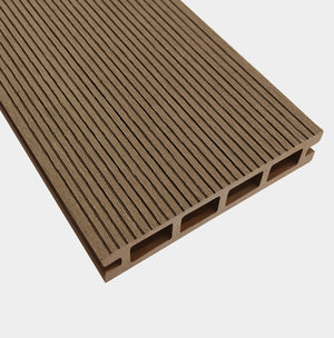 Teak composite decking boards installed on a modern outdoor garden deck